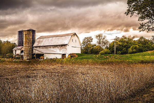 Barn Art Print featuring the photograph Barn Silos Storm Clouds by Ron Pate