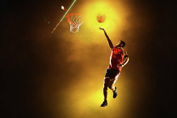 People Art Print featuring the photograph Basketball Player Jumping With Glowing by Stanislaw Pytel