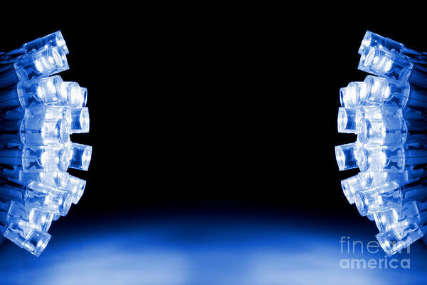 Glowing Art Print featuring the photograph Blue LED lights both sides of the image with space for text by Simon Bratt