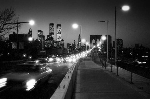 1980s Art Print featuring the photograph Brooklyn Bridge and Manhattan skyline at dusk 1980s by Gary Eason