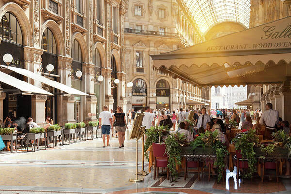 Crowd Art Print featuring the photograph Cafes In Ornate Galleria by Cultura Rm Exclusive/walter Zerla