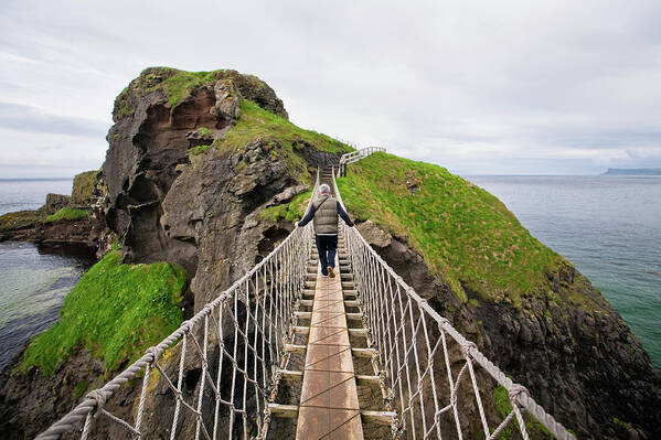 Mature Adult Art Print featuring the photograph Carrick-a-rede Rope Bridge, Co. Antrim by David Soanes Photography