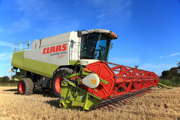Combine Harvester Art Print featuring the photograph Claas Lexion 470 Evolution Combine Harvester by Paul Lilley