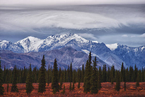 Alaskan Mountains Art Print featuring the photograph Clouds over mountains by Jeff Folger