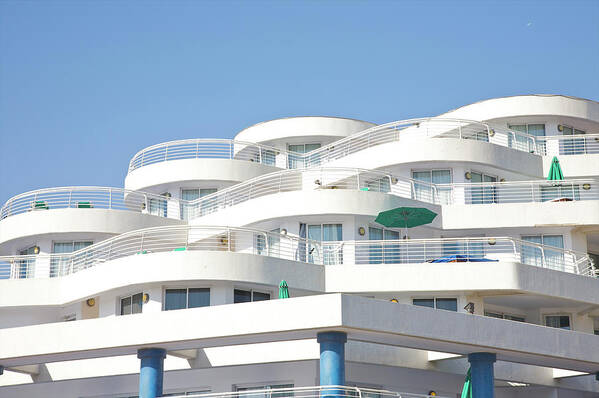 Viewpoint Art Print featuring the photograph Curved White Balcony Bands Under Blue by Barry Winiker
