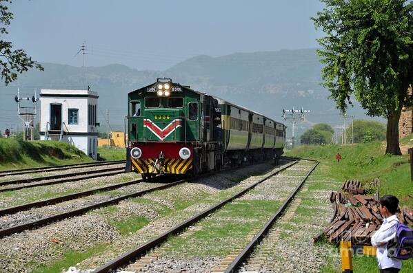 Train Art Print featuring the photograph Pakistan Railways diesel electric locomotive train engine speeds past student by Imran Ahmed