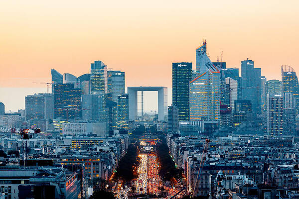 Financial Building Art Print featuring the photograph Elevated view of illuminated skyscrapers at La Defense financial district and Avenue des Champs-Elysees at dusk, Paris, France by Alexander Spatari