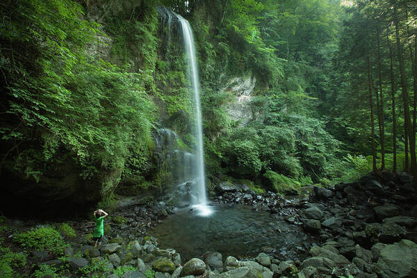 Scenics Art Print featuring the photograph Enjoying A Waterfall In Lush Forest by Ippei Naoi