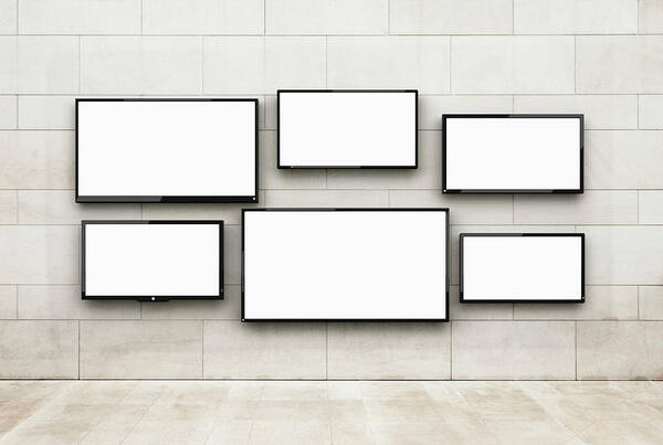 Flat Art Print featuring the photograph Flat Screens Hanging On A Wall by Jorg Greuel