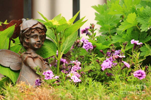 Angel Art Print featuring the photograph Flower-bed mit an angel statue by Amanda Mohler