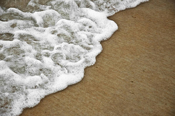 Beach Art Print featuring the photograph Foamy Beach Tide by Carolyn Marshall