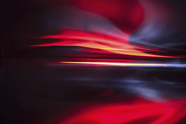 Purple Art Print featuring the photograph Full frame abstract image of vibrant red light trails by Ralf Hiemisch