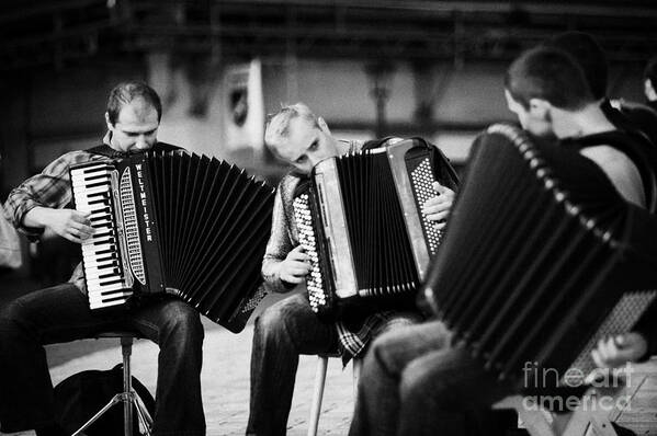 Europe Art Print featuring the photograph Group Of Accordion Players Perform In The Street In Rynek Glowny Town Square Krakow by Joe Fox