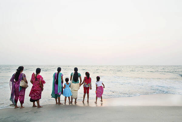 Water's Edge Art Print featuring the photograph Group Of Indian Woman And Children by Gary John Norman
