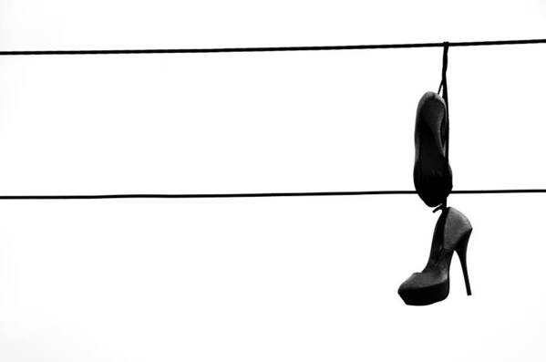 Shoes On The Line Art Print featuring the photograph Hooked and Booked by J C