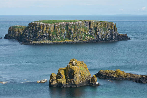 Rock Formation Art Print featuring the photograph Island Off The Coast Near Ballintoy by Carl Bruemmer