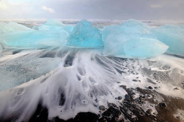 Water's Edge Art Print featuring the photograph Jokulsarlon, Icebergs Washed Onto Shore by Travelpix Ltd
