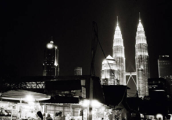 Petronas Towers Art Print featuring the photograph Night in Kampung Baru by Shaun Higson