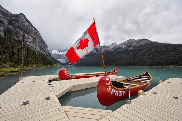 Lake Art Print featuring the photograph Lake Louise Canoes and Flag by Jack Nevitt