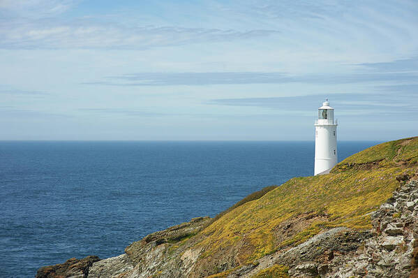 Tranquility Art Print featuring the photograph Lighthouse On Cornish Atlantic by Dougal Waters