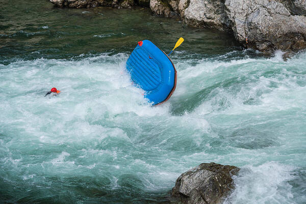 Sports Helmet Art Print featuring the photograph Man floating in a river after his raft flipped over while white water river rafting by Tdub303