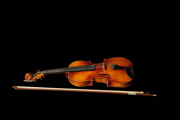 Violin Art Print featuring the photograph My old fiddle and bow by Torbjorn Swenelius