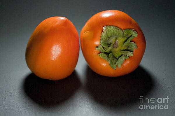 Persimmon Art Print featuring the photograph Pair Of Persimmons by Dan Holm