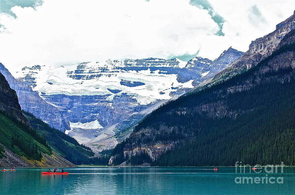 Lake Louise Alberta Red Art Print featuring the photograph Red Canoes Turquoise Water by Linda Bianic
