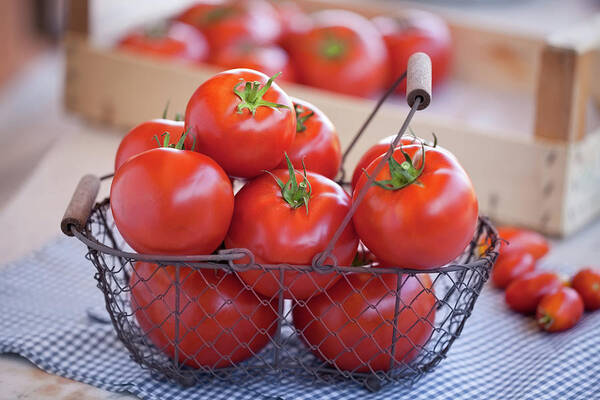 Heap Art Print featuring the photograph Ripe Tomatoes In A Basket by Ursula Alter