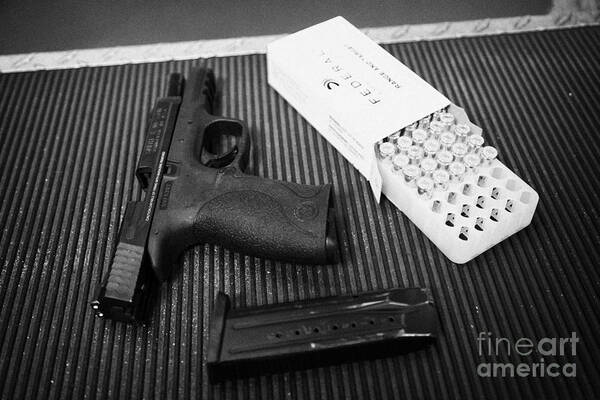 Shooting Art Print featuring the photograph Smith And Wesson 9mm Handgun With Ammunition At A Gun Range by Joe Fox