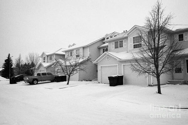 Snow Art Print featuring the photograph snow falling in residential street during winter Saskatoon Saskatchewan Canada by Joe Fox