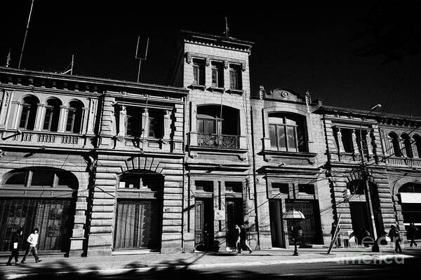 Sociedad Art Print featuring the photograph Sociedad Menendez Behety building and hernando de magallanes street Punta Arenas Chile by Joe Fox