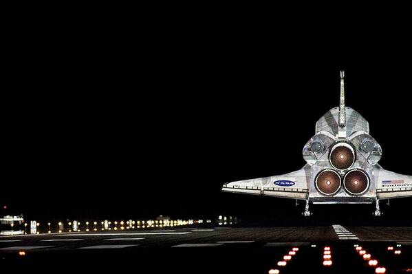 Vehicle Art Print featuring the photograph Space Shuttle Landing At Night by Nasa/science Photo Library
