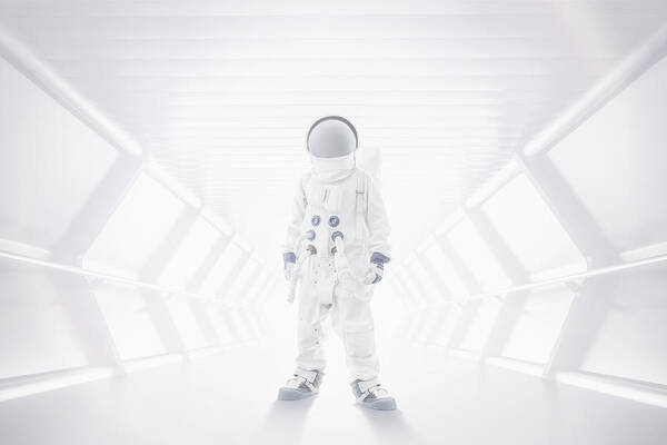 Sports Helmet Art Print featuring the photograph Spaceman standing in tunnel by Tim Bird