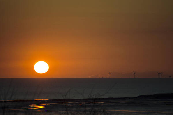 Sun Art Print featuring the photograph Sunset Over The Windfarm by Spikey Mouse Photography