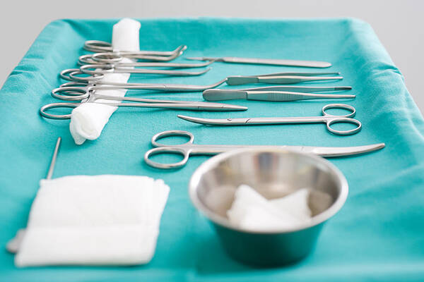 In A Row Art Print featuring the photograph Surgical equipment by Image Source