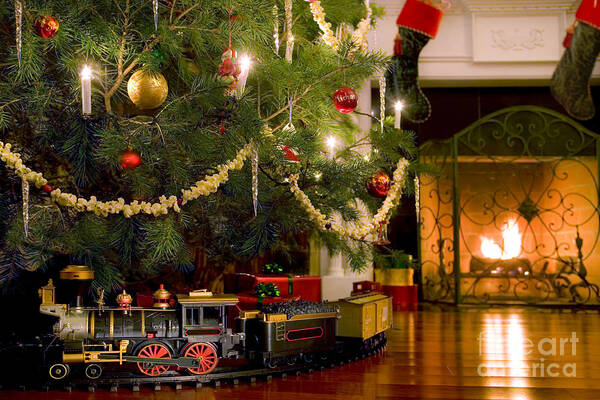 Christmas Art Print featuring the photograph Toy Train Under the Christmas Tree by Diane Diederich
