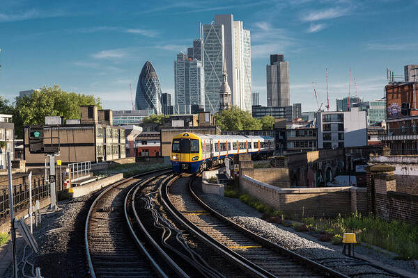 Shadow Art Print featuring the photograph Train Leaving The City, London Uk by Tim E White