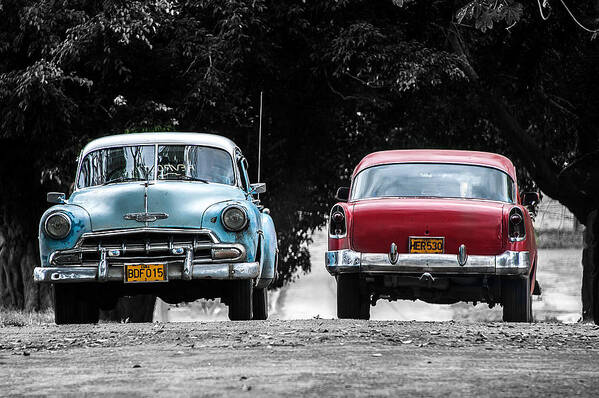  Cuba Art Print featuring the photograph Two cars passing by Patrick Boening