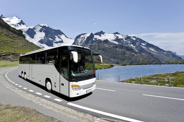 Land Vehicle Art Print featuring the photograph White bus crossing the alpes by Grafissimo