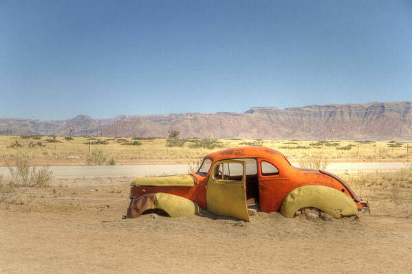 Afrika Art Print featuring the photograph Wreck on the Highway by Juergen Klust