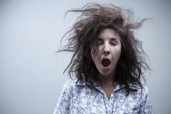 People Art Print featuring the photograph Young woman yawning, close up by David Zach