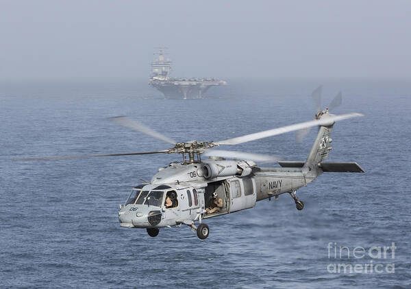 Arabian Sea Art Print featuring the photograph A Mh-60s Knighthawk Conducts A Vertical by Gert Kromhout