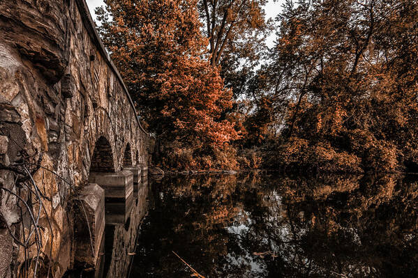 Bridge Lake River Water Creek Pond Tree Trees Leaf Leaves Orange Red Brown Yellow Yellowism Calm Reflection Reflect Stone Rock Sky Stage Staging Real Estate Sell House Decorate Art Print featuring the photograph Bridge to Autumn by Tom Gort