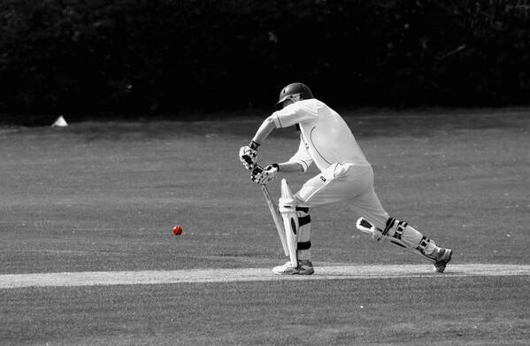 Cricket Art Print featuring the photograph Cricketer in black and white with red ball by Chris Day