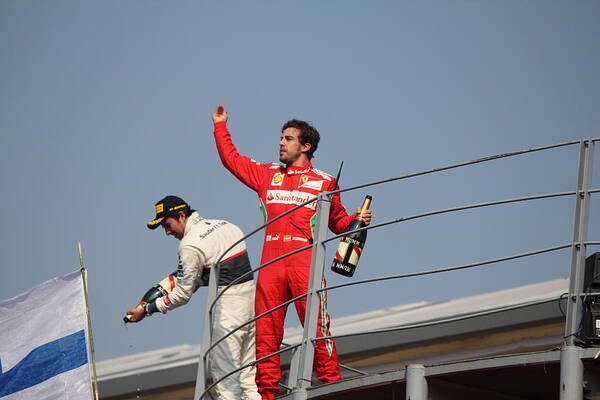 Fernando Alonso Art Print featuring the photograph Fernando Alonso and Sergio Perez by David Grant