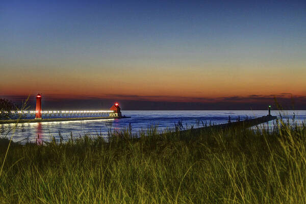 Evening Glow Art Print featuring the photograph Overlooking the Piers by Richard Gregurich