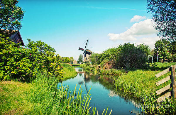 Netherlands Art Print featuring the photograph Typical Dutch Windmill by Ariadna De Raadt