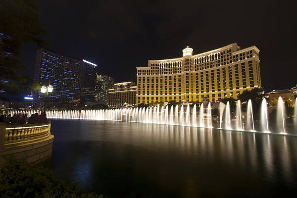 Bellagio Art Print featuring the photograph Bellagio Fountain in Las Vegas at night by Sven Brogren