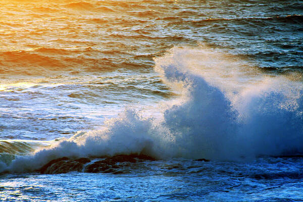 Energizing ocean waves in the golden light